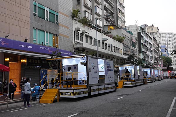 油麻地疫情兇勢封禁 區內居民紛紛囤積食水 冀長痛不如短痛