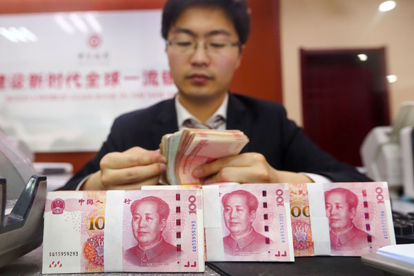 人行雙料操作放水近5千億 易綱稱現行利率水平合適