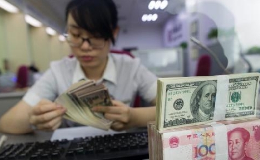 匯率漲破6.9 人民幣穩中走強