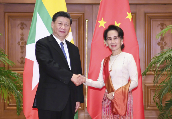 习近平同缅甸国务资政昂山素季会谈 