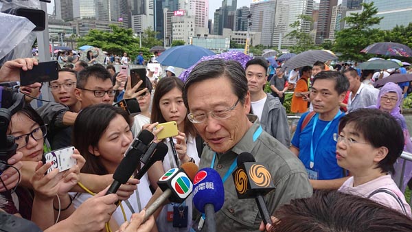 吳光正溢價五成私有化會德豐