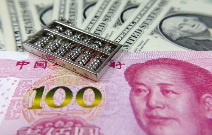 人民币兑美元中间价报7.0638 下调72点