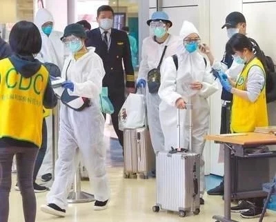 从美返台少年不在“必须筛检之列”引热议 疫情检测成岛内蓝绿对抗焦点