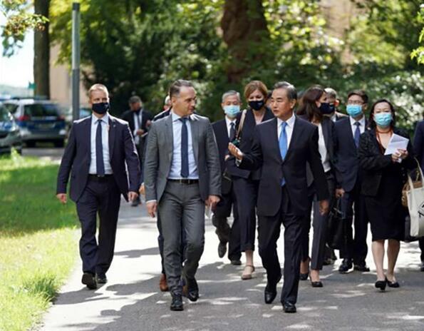 王毅：中德两国应加强国际抗疫合作 重振世界经济