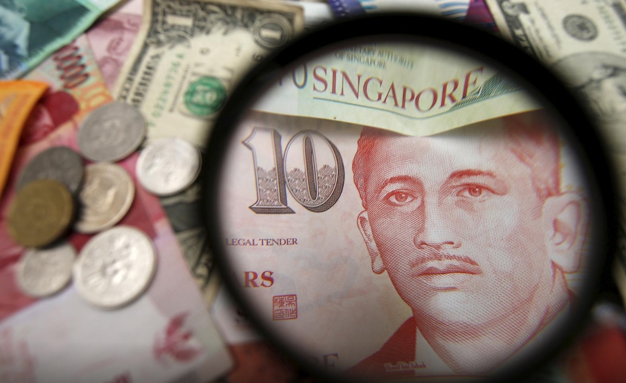 路透调查：美元走弱提振亚币多头押注