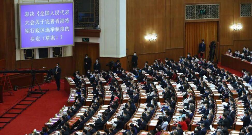 新华社评论员：豐富發展「一國兩制」和基本法實踐的重大舉措