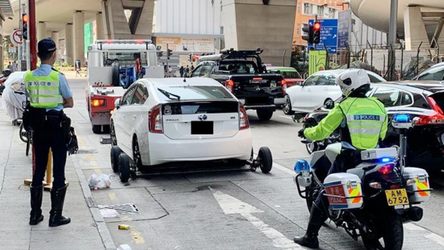 警方西九龍打擊違例泊車 發3788張告票拖走11車