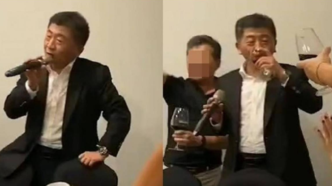 台衛福部長未戴口罩高歌飲酒 身旁白衣男子背景驚人