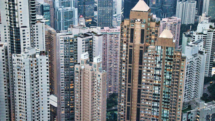 中原料明年港樓價升一成