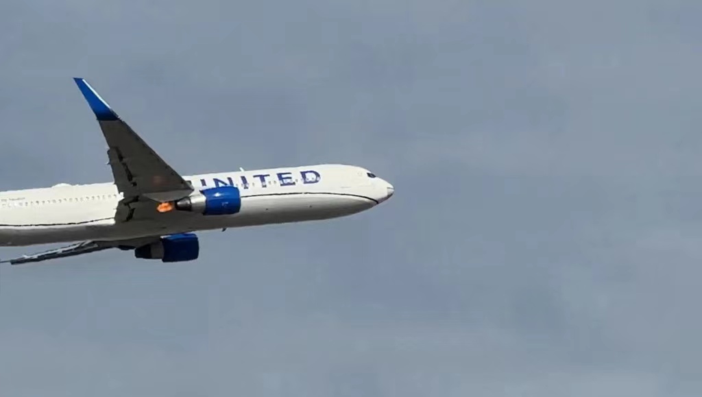 聯合航空香港飛關島航機引擎故障折返急降 消防警方到場