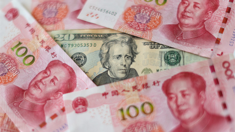 人民幣兌美元中間價調升211個基點