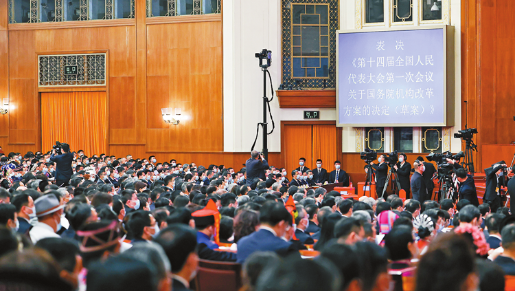 兩會觀察丨全國人大會議批准國務院機構改革方案 港澳代表冀加強金融科技對接