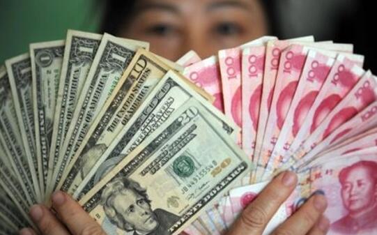 人民幣兌美元中間價報6.8771元 下調22個基點