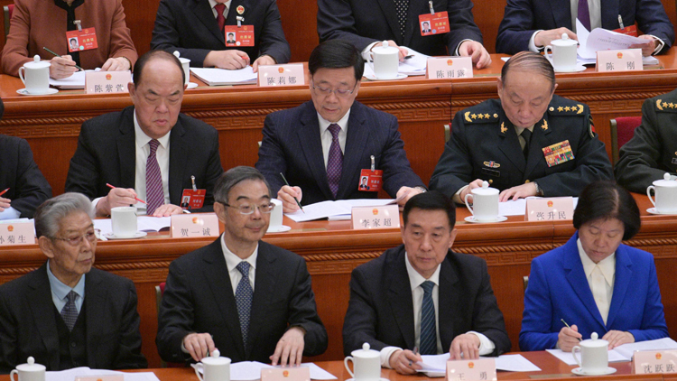 李家超列席全國人大會議開幕會 指繼續全面準確堅定不移貫徹「一國兩制」