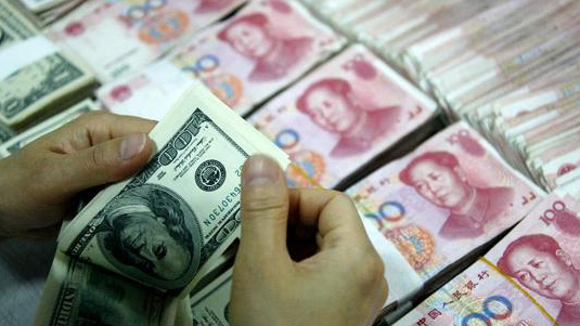 22日人民幣兌美元中間價報7.1696 調升7個基點