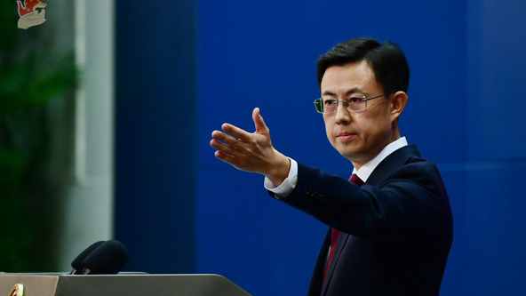 若美方別有所圖執意損害中國的利益 中方必將奉陪到底