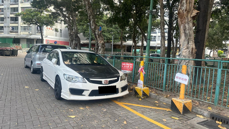 申訴專員主動調查公屋違例泊車  房署接納12項改善建議