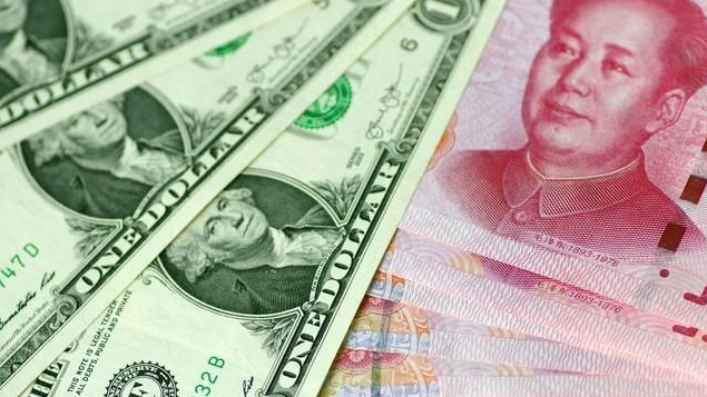 人民幣兌美元中間價報7.1803 上調12點