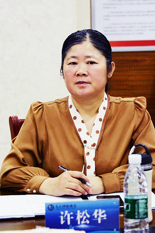 图三 九江国际商会副会长许松华汇报商会成立以来的工作情况.jpg