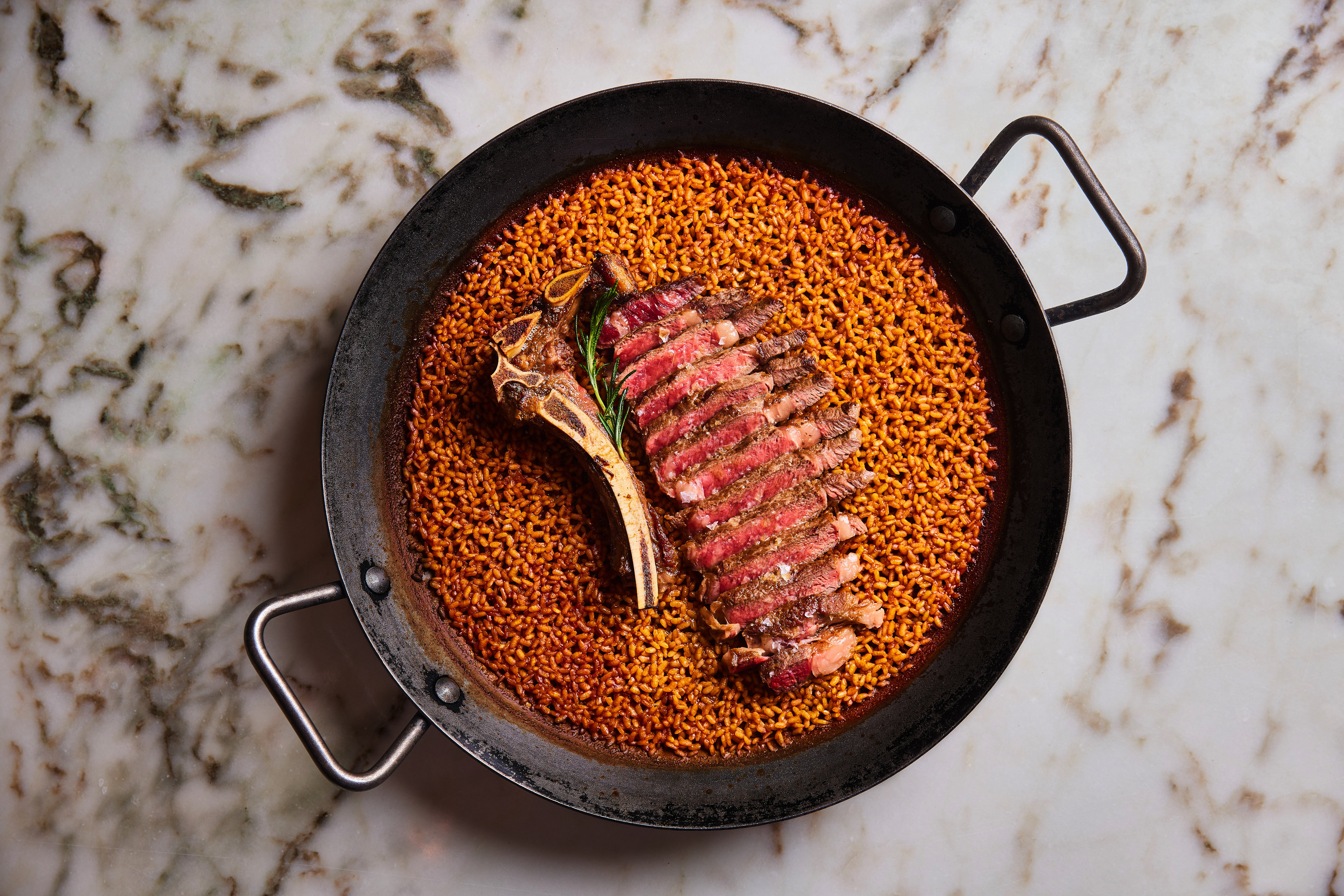 RWHKG_FB_Restaurant_Bayfare Social_Striploin Paella_1.jpg